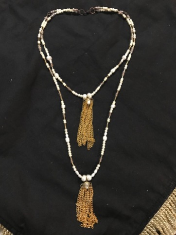 White and off-white two-strand tassle pendant necklace